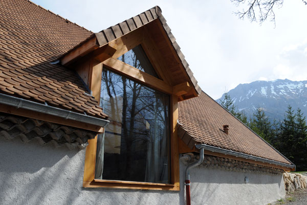 Triève, construction d'une ouverture en toiture fenière